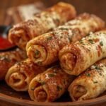 Crispy Tortilla Pizza Rolls served hot with marinara – family-friendly dinner idea by Recipench