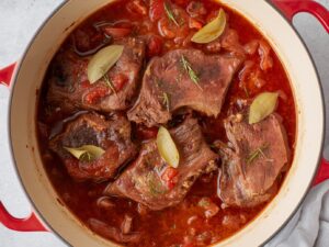 Short ribs cooking in tomato sauce