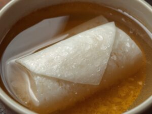 Rice paper wrapper softening in water