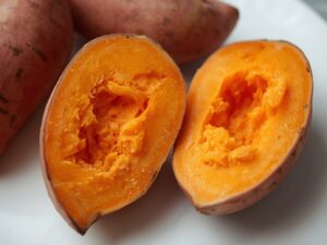 Halved sweet potatoes with flesh scooped out
